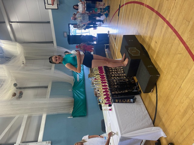 Holly on the podium at a dance competition