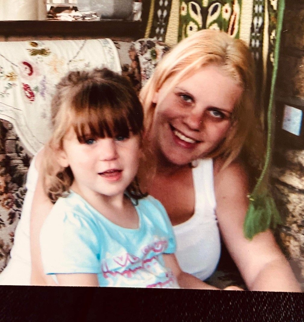 Young Holly with her mum Micala
